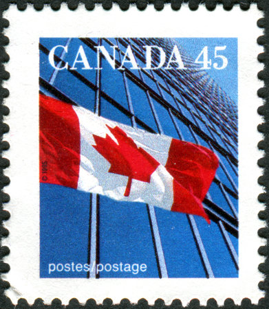 CANADA - CIRCA 1995: Postage stamp printed in Canada shows the national flag, circa 1995のeditorial素材