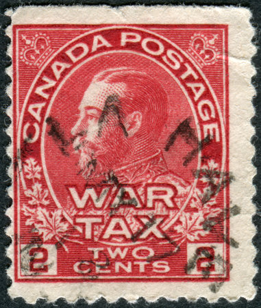 CANADA - CIRCA 1915: Postage stamp printed in Canada (War Tax Stamp), a portrait of King George V in the uniform of the Admiral, circa 1915のeditorial素材