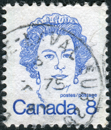 CANADA - CIRCA 1973: Postage stamp printed in Canada, shows Queen Elizabeth II, circa 1973のeditorial素材