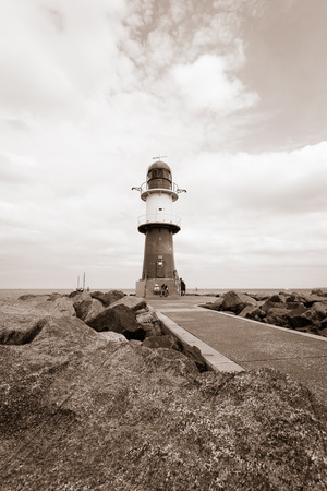 Lighthouse on the sea. Sepiaの写真素材