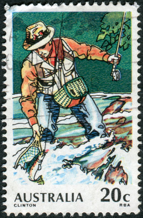 AUSTRALIA - CIRCA 1979: Postage stamp printed in Australia, dedicated to Sport fishing, shows Trout Fishing, circa 1979のeditorial素材