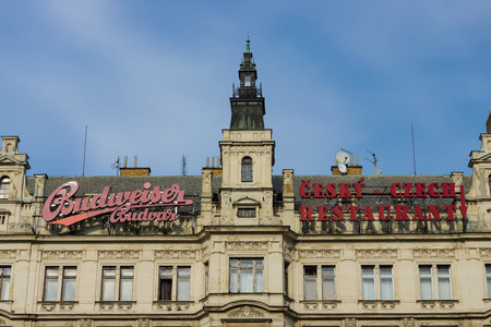 PRAGUE, CZECH REPUBLIC - SEPTEMBER 18, 2014: Facade of an old building with advertising Czech cuisine and beer Budweiser. Prague is the capital and largest city of the Czech Republic.のeditorial素材
