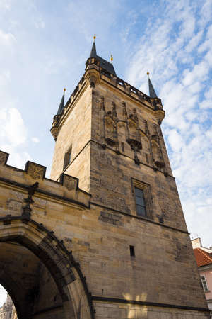 Watchtower on the Charles Bridge on the background of blue sky.の写真素材