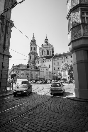PRAGUE, CZECH REPUBLIC - SEPTEMBER 19, 2014: St. Nicholas Church. District Mala Strana - Lesser Town of Prague. Black and white. Prague is the capital and largest city of the Czech Republic.のeditorial素材