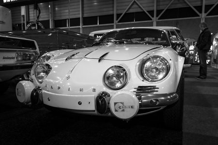 MAASTRICHT, NETHERLANDS - JANUARY 08, 2015: Sports car Renault Alpine A110 "Berlinette". Stylization. Black and white. International Exhibition InterClassics & Topmobiel 2015のeditorial素材