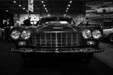 MAASTRICHT, NETHERLANDS - JANUARY 08, 2015: Luxury car Lancia Flaminia GTL by Carrozzeria Touring. Black and white. International Exhibition InterClassics & Topmobiel 2015のeditorial素材
