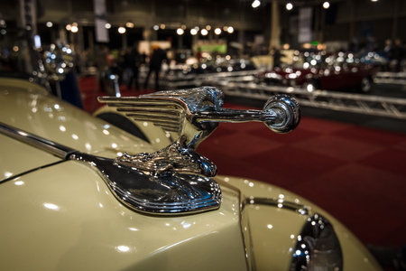 MAASTRICHT, NETHERLANDS - JANUARY 08, 2015: Hood ornament Goddess of Speed (donuts chaser) of a Packard 120 Convertible Sedan with Dietrich Body, 1937. International Exhibition InterClassics & Topmobiel 2015のeditorial素材