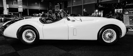 MAASTRICHT, NETHERLANDS - JANUARY 09, 2015: A sports car Jaguar XK120, "NUB120", 1950. Black and white. International Exhibition InterClassics & Topmobiel 2015のeditorial素材