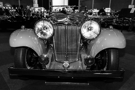 MAASTRICHT, NETHERLANDS - JANUARY 09, 2015: A sports car Jaguar SS1 Tourer, 1934. Black and white. International Exhibition InterClassics & Topmobiel 2015のeditorial素材