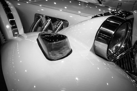 MAASTRICHT, NETHERLANDS - JANUARY 09, 2015: Fragment of a wedding limousine, neo-classic car Cmc Tiffany, built based on modern cars Ford. Black and white. International Exhibition InterClassics & Topmobiel 2015のeditorial素材