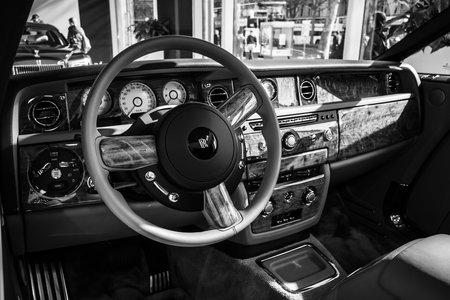 BERLIN - MARCH 08, 2015: Showroom. Cabin of a luxury car Rolls-Royce Phantom Drophead Coupe. Black and white. Rolls-Royce Motor Cars Limited global manufacturer of luxury cars.のeditorial素材