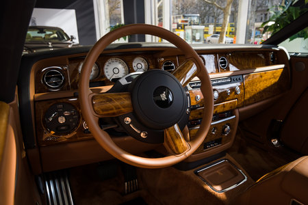 BERLIN - MARCH 08, 2015: Showroom. Cabin of a luxury car Rolls-Royce Phantom Drophead Coupe. Rolls-Royce Motor Cars Limited global manufacturer of luxury cars.のeditorial素材