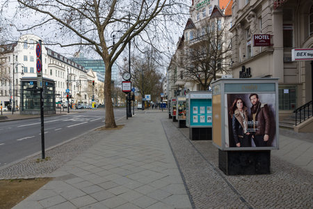 BERLIN - FEBRUARY 22, 2015: Outdoor advertising on the famous shopping street of West Berlin - Kurfuerstendamm.のeditorial素材