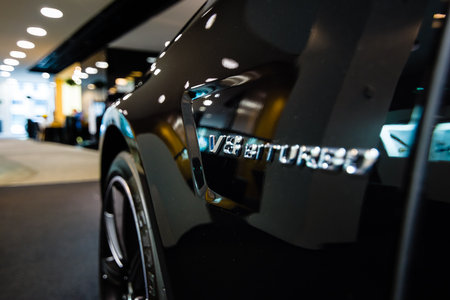 BERLIN - JANUARY 24, 2015: Showroom. Fragment of a mid-size luxury car Mercedes-Benz CLS 63 AMG....