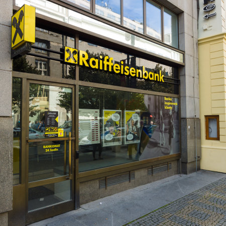 PRAGUE - SEPTEMBER 20, 2014: The branch of Raiffeisen Bank. Raiffeisen Bank - the largest co-operative banks in Europe, has more than 3,000 branches and 58,000 employeesのeditorial素材