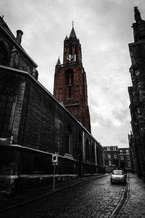 MAASTRICHT, NETHERLANDS - JANUARY 09, 2015: Vrijthof square. Belfry of the Evangelical Church of John the Baptist. Toning. Stylization. Maastricht is the oldest city of the Netherlands and the capital city of the province of Limburg.のeditorial素材