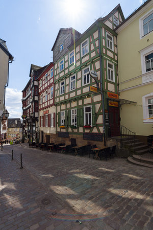 MARBURG, GERMANY - APRIL 18, 2015: Historic streets of the old quarters of Marburg. District Oberstadt. Marburg is a university town in the German federal state (Bundesland) of Hessen.のeditorial素材