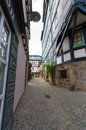 MARBURG, GERMANY - APRIL 18, 2015: Historic streets of the old quarters of Marburg. District Oberstadt. Marburg is a university town in the German federal state (Bundesland) of Hessen.のeditorial素材
