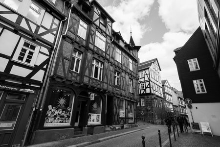 MARBURG, GERMANY - APRIL 18, 2015: Historic streets of the old quarters of Marburg. District Oberstadt. Black and white. Marburg is a university town in the German federal state (Bundesland) of Hessen.のeditorial素材