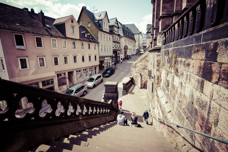 MARBURG, GERMANY - APRIL 18, 2015: Historic streets of the old quarters of Marburg. Toning. Stylization. Marburg is a university town in the German federal state (Bundesland) of Hessen.のeditorial素材