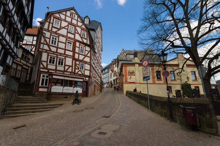 MARBURG, GERMANY - APRIL 18, 2015: Historic streets of the old quarters of Marburg. Marburg is a university town in the German federal state (Bundesland) of Hessen.のeditorial素材