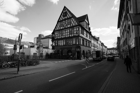 MARBURG, GERMANY - APRIL 18, 2015: Historic streets of the old quarters of Marburg. Black and white. Marburg is a university town in the German federal state (Bundesland) of Hessen.のeditorial素材