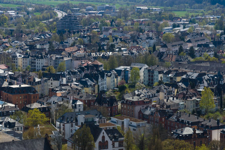 MARBURG, GERMANY - APRIL 18, 2015: The new and the old part of the city from the surrounding hills. Marburg is a university town in the German federal state (Bundesland) of Hessen.のeditorial素材