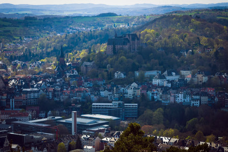 MARBURG, GERMANY - APRIL 18, 2015: The new and the old part of the city from the surrounding hills. Marburg is a university town in the German federal state (Bundesland) of Hessen.のeditorial素材
