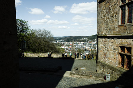 MARBURG, GERMANY - APRIL 18, 2015: View of the historic town center, from the courtyard Marburger Schloss (Marburg castle). Stylization. Toning.のeditorial素材