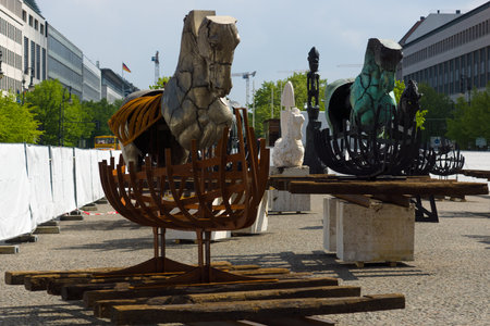 BERLIN - MAY 01, 2015: Gustavo Aceves presents his sculptures at the exhibition "Lapidarium", which takes place at the Pariser Platz near the Brandenburg Gate.のeditorial素材