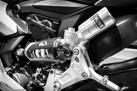 BERLIN - MAY 02, 2015: Showroom. Detail of a sport bike Ducati 1299 Panigale by Ducati Corse racing team. Black and white. Produced since 2015.のeditorial素材