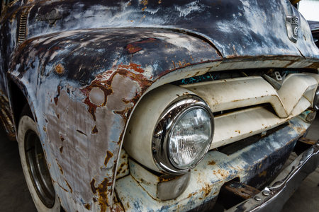 PAAREN IM GLIEN, GERMANY - MAY 23, 2015: Fragment of rusted body of full-size pickup truck Ford F100. The oldtimer show in MAFZ.のeditorial素材