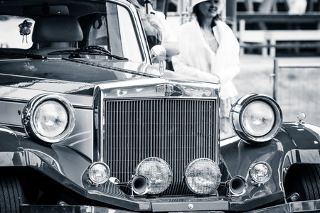 PAAREN IM GLIEN, GERMANY - MAY 23, 2015: Fragment of a car in retro style Clenet Coachworks Series II. Black and white. The oldtimer show in MAFZ.のeditorial素材