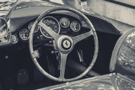 BERLIN - JUNE 14, 2015: Cockpit of a sports car Ferrari 500 TR, 1956. Black and white. Stylization. The Classic Days on Kurfuerstendamm.のeditorial素材