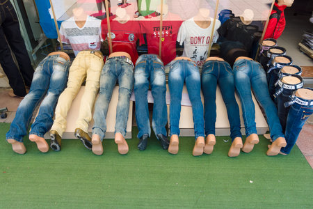 AVSALLAR, TURKEY - JULY 01, 2015: Samples of jeans worn by mannequins. Shop selling jersey.のeditorial素材