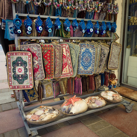 AVSALLAR, TURKEY - JULY 01, 2015: Sale of covers for laptops and tablets. Traditional Turkish ornament. Bazaar. Turkey.のeditorial素材
