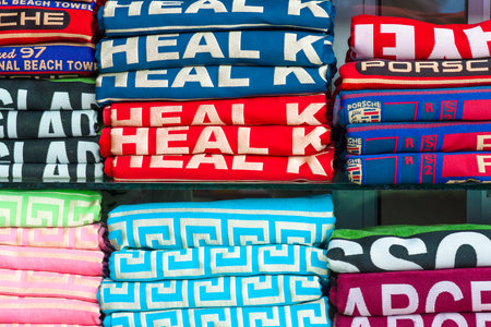 AVSALLAR, TURKEY - JUNE 30, 2015: A stack of bath towels of different brands. Background.のeditorial素材