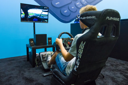 BERLIN - SEPTEMBER 04, 2015: Presentation of game controllers Logitech. International radio exhibition Berlin (IFA2015).のeditorial素材