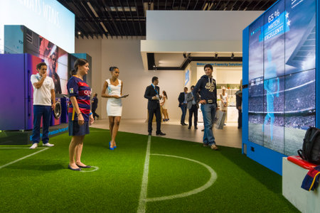 BERLIN - SEPTEMBER 04, 2015: Stand of company Beko. Interactive game of football. International radio exhibition Berlin (IFA2015).のeditorial素材
