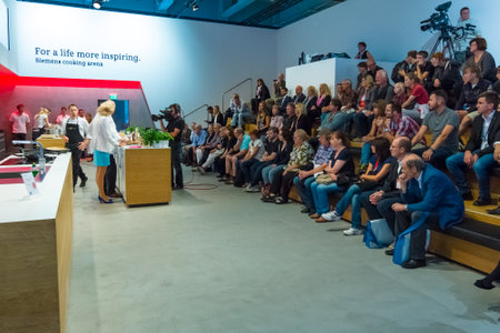 BERLIN - SEPTEMBER 04, 2015: Stand by Siemens. Master class from chef Alfons Schuhbeck. International radio exhibition Berlin (IFA2015).のeditorial素材