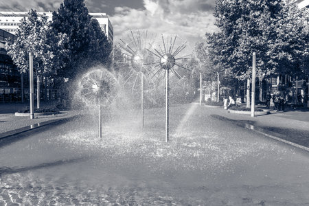 DRESDEN, GERMANY - SEPTEMBER 09, 2015: A beautiful fountain in the form of a ball on the square in the old town. Stylization. Toning. Dresden is the capital city of the Free State of Saxony.のeditorial素材