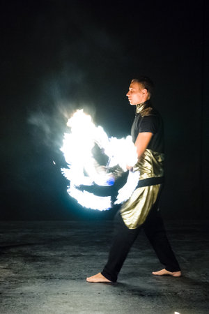 AVSALLAR, TURKEY - JUNE 30, 2015: Fire show. Evening performance on the beach for vacationers. Anatolian coast - a popular holiday destination in summer of European citizens.のeditorial素材