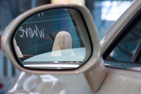 BERLIN - SEPTEMBER 04, 2012: Showroom. Detail (rear view mirror) of a personal luxury car Bentley New Continental GT V8 convertible. Produced since 2013.のeditorial素材