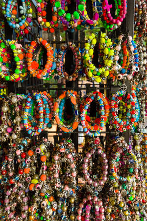 Traditional Turkish souvenirs - Bracelets with charms against the evil eye. Background.