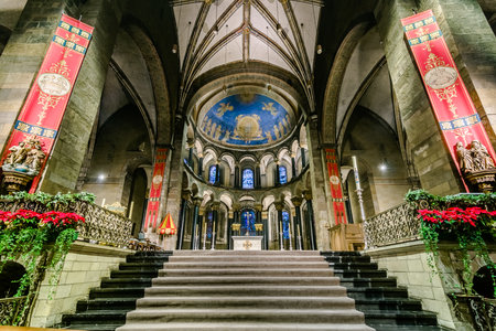 MAASTRICHT, NETHERLANDS - JANUARY 13, 2016: Interior of Basilica of Our Lady of the Assumption. The oldest church of the Netherlands. Construction started shortly after 1000 AD. Toning, HDR.のeditorial素材