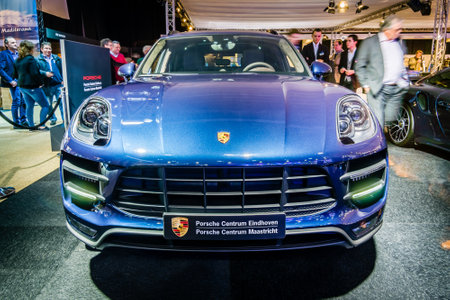 MAASTRICHT, NETHERLANDS - JANUARY 14, 2016: Compact luxury crossover Porsche Macan Turbo. International Exhibition InterClassics & Topmobiel 2016のeditorial素材