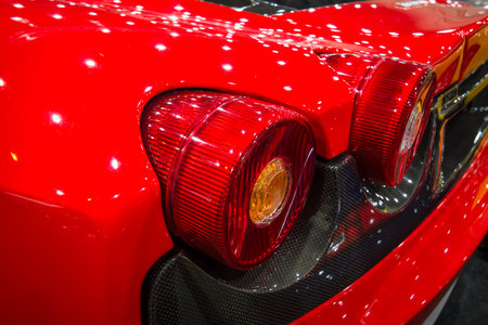 MAASTRICHT, NETHERLANDS - JANUARY 15, 2016: Stoplight of a sports car Ferrari F430, close-up, 2006....