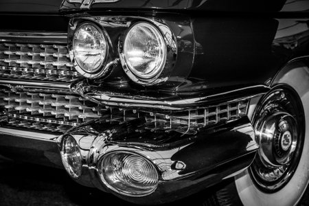 MAASTRICHT, NETHERLANDS - JANUARY 15, 2016: Fragment of full-size luxury car Cadillac Coupe de Ville, 1959. Black and white. International Exhibition InterClassics & Topmobiel 2016のeditorial素材