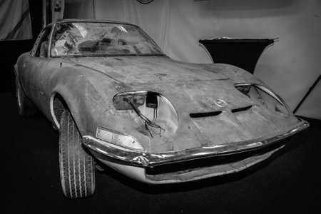 MAASTRICHT, NETHERLANDS - JANUARY 15, 2016: Rusty body of sports car Opel GT. Black and white. International Exhibition InterClassics & Topmobiel 2016のeditorial素材