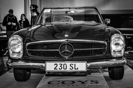 MAASTRICHT, NETHERLANDS - JANUARY 15, 2016: Sports car Mercedes-Benz 230 SL (W113), 1964. Blacl and white. International Exhibition InterClassics & Topmobiel 2016のeditorial素材